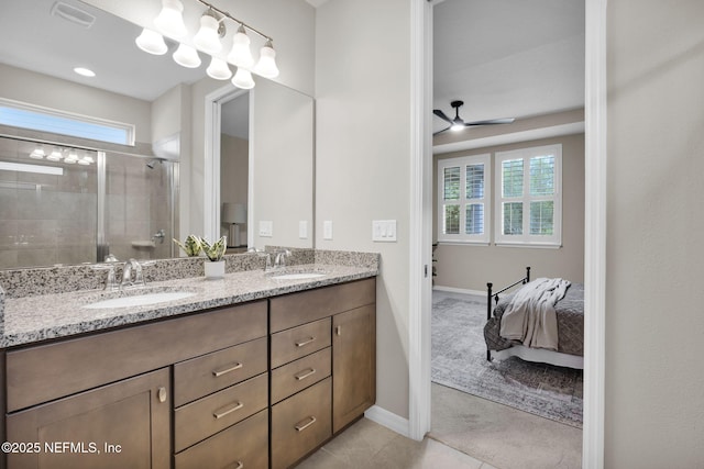 221 Broomsedge Cir, Saint Augustine, FL 32095 - ensuite bathroom featuring double vanity, a shower stall, plenty of natural light, and ceiling fan