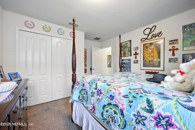 499 Ashby Landing Way, Saint Augustine, FL 32086 - carpeted bedroom with a closet and a textured ceiling