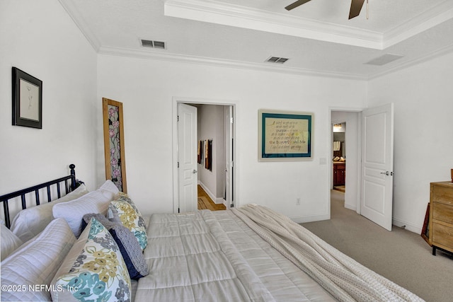 13527 Isla Vista Dr, Jacksonville, FL 32224 - carpeted bedroom with ornamental molding, baseboards, ceiling fan, and a raised ceiling