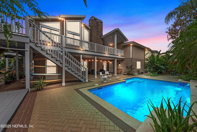 224 Bowles St, Neptune Beach, FL 32266 - swimming pool featuring a deck, stairway, and a patio