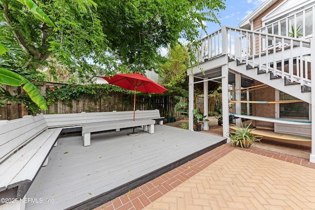 224 Bowles St, Neptune Beach, FL 32266 - deck with a fenced backyard, stairs, and a patio