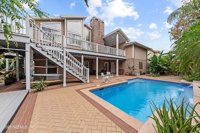 224 Bowles St, Neptune Beach, FL 32266 - swimming pool with a deck, a patio area, and stairway