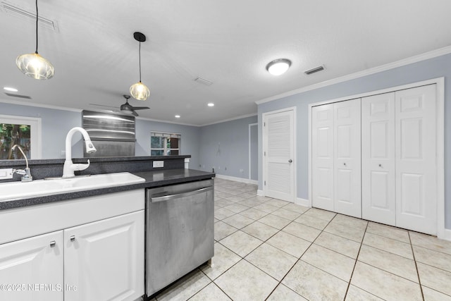 224 Bowles St, Neptune Beach, FL 32266 - kitchen with dishwasher, a sink, dark countertops, crown molding, and white cabinetry