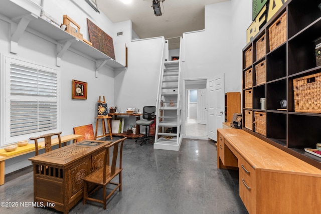 224 Bowles St, Neptune Beach, FL 32266 - office area with a towering ceiling and concrete floors
