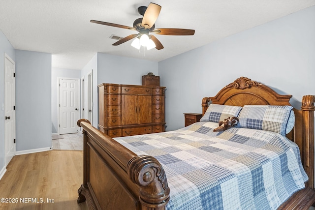 952 Long Lake Dr, Jacksonville, FL 32225 - bedroom featuring light wood finished floors, baseboards, and a ceiling fan