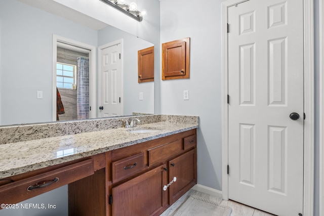 952 Long Lake Dr, Jacksonville, FL 32225 - bathroom featuring vanity and baseboards