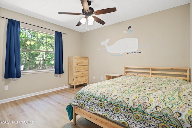 952 Long Lake Dr, Jacksonville, FL 32225 - bedroom with wood finished floors, baseboards, and a ceiling fan