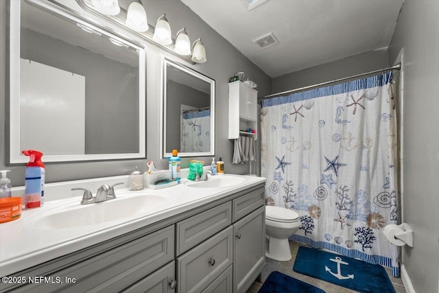 2438 Sylvan Chase Dr, Orange Park, FL 32073 - full bath featuring toilet, double vanity, and a shower with shower curtain