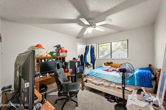 2438 Sylvan Chase Dr, Orange Park, FL 32073 - bedroom featuring carpet flooring, a textured ceiling, a desk, and ceiling fan