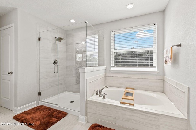 full bath featuring a bath, a stall shower, tile patterned floors, and recessed lighting