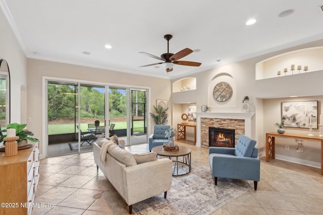 2214 Links Dr, Fleming Island, FL 32003 - living area with ornamental molding, recessed lighting, ceiling fan, a stone fireplace, and baseboards