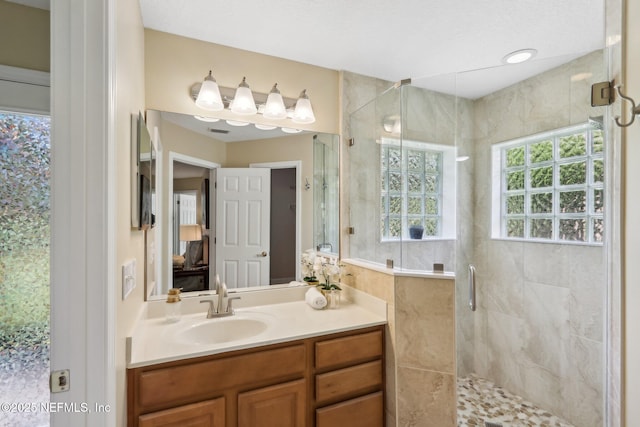 2214 Links Dr, Fleming Island, FL 32003 - ensuite bathroom featuring a stall shower and vanity