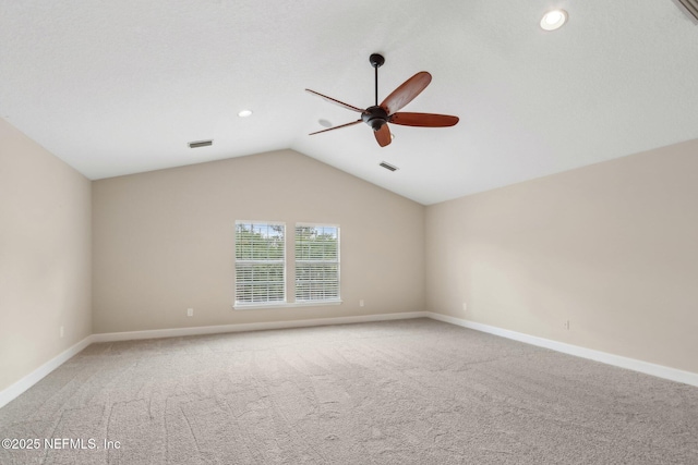 2214 Links Dr, Fleming Island, FL 32003 - empty room featuring a ceiling fan, light carpet, baseboards, vaulted ceiling, and recessed lighting