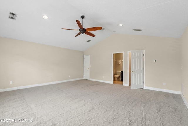 2214 Links Dr, Fleming Island, FL 32003 - unfurnished bedroom featuring vaulted ceiling, baseboards, carpet floors, recessed lighting, and ensuite bath