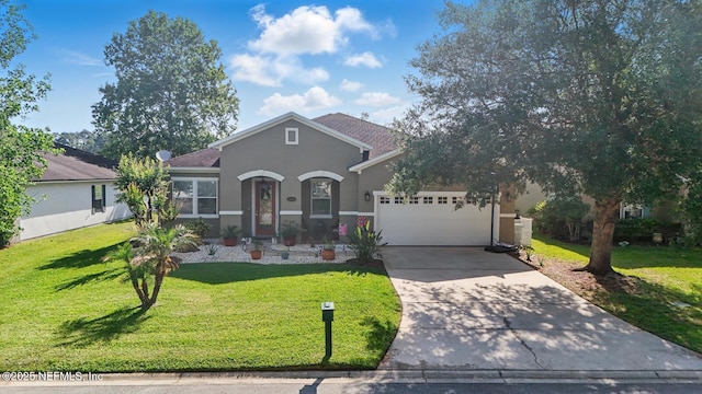 4956 Cypress Links Blvd, Elkton, FL 32033 - view of front facade featuring stucco siding, driveway, an attached garage, and a front lawn