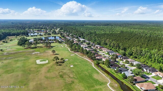 4956 Cypress Links Blvd, Elkton, FL 32033 - aerial view of property's location featuring a forest, a large body of water, and nearby suburban area