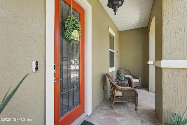 4956 Cypress Links Blvd, Elkton, FL 32033 - entrance to property with stucco siding and a porch