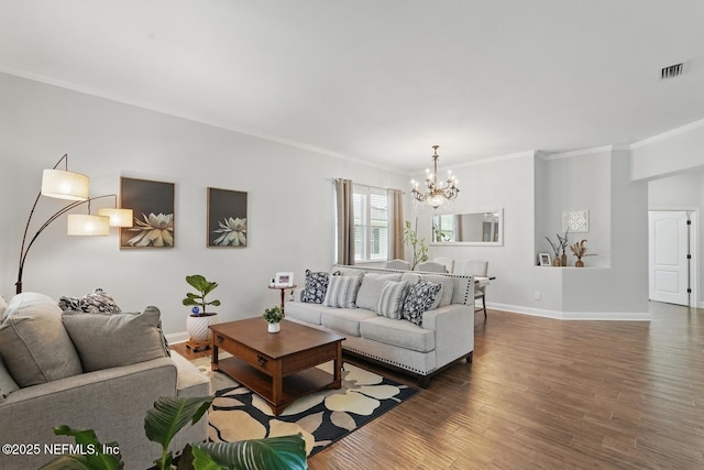 4956 Cypress Links Blvd, Elkton, FL 32033 - living room featuring a chandelier, crown molding, wood finished floors, and baseboards