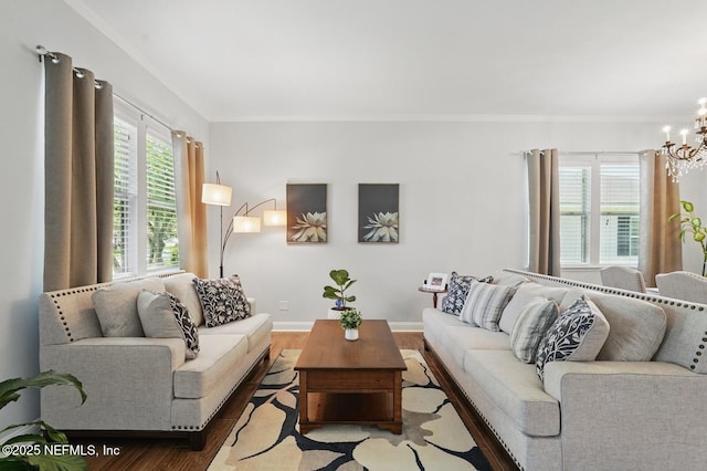 4956 Cypress Links Blvd, Elkton, FL 32033 - living room with a chandelier, wood finished floors, ornamental molding, and baseboards