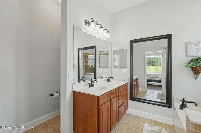 4956 Cypress Links Blvd, Elkton, FL 32033 - full bath featuring double vanity, tile patterned flooring, a bathtub, and baseboards