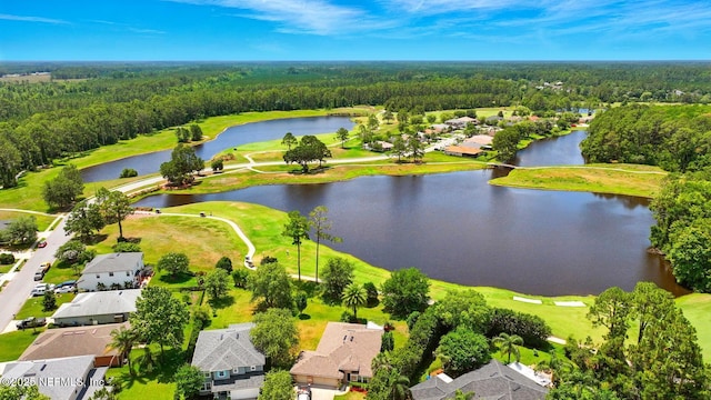 4956 Cypress Links Blvd, Elkton, FL 32033 - aerial perspective of suburban area featuring a heavily wooded area, a large body of water, and a local golf course