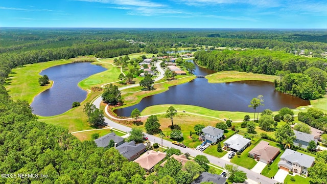 4956 Cypress Links Blvd, Elkton, FL 32033 - view of property location with a heavily wooded area, a nearby body of water, a local golf course, and nearby suburban area