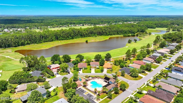 4956 Cypress Links Blvd, Elkton, FL 32033 - aerial perspective of suburban area featuring a local golf course, a large body of water, a forest, and a pool