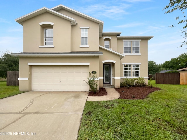 3124 Hidden Lake Cv, Middleburg, FL 32068 - traditional home with stucco siding, driveway, and a garage