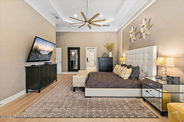 201 Royal Tern Rd N, Ponte Vedra Beach, FL 32082 - bedroom with crown molding, wood finished floors, a high ceiling, baseboards, and recessed lighting