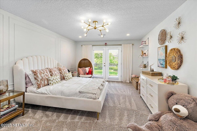201 Royal Tern Rd N, Ponte Vedra Beach, FL 32082 - bedroom with access to outside, light colored carpet, a textured ceiling, recessed lighting, and a chandelier