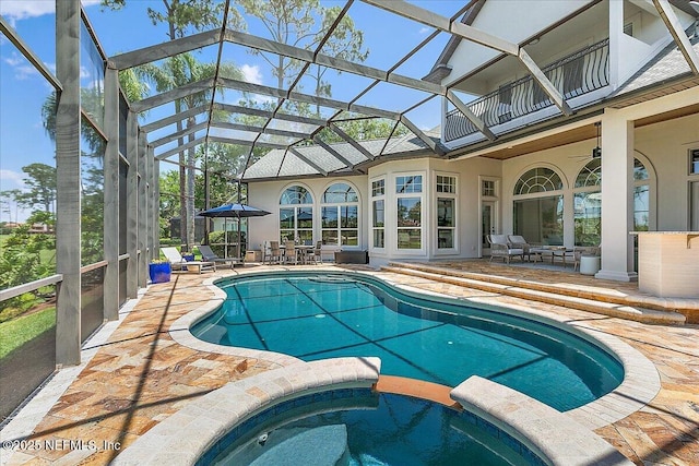 201 Royal Tern Rd N, Ponte Vedra Beach, FL 32082 - view of swimming pool featuring a patio area, a pool with connected hot tub, and glass enclosure