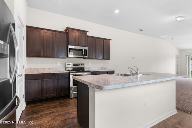 8244 Meadow Walk Ln, Jacksonville, FL 32256 - kitchen featuring appliances with stainless steel finishes, a sink, dark wood-style flooring, dark brown cabinetry, and light countertops