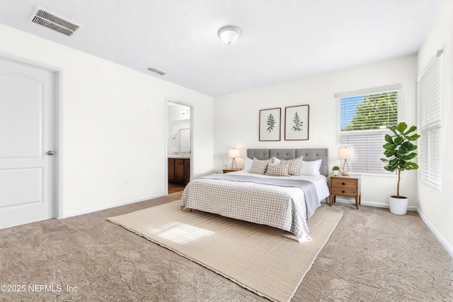 8244 Meadow Walk Ln, Jacksonville, FL 32256 - carpeted bedroom with baseboards and connected bathroom