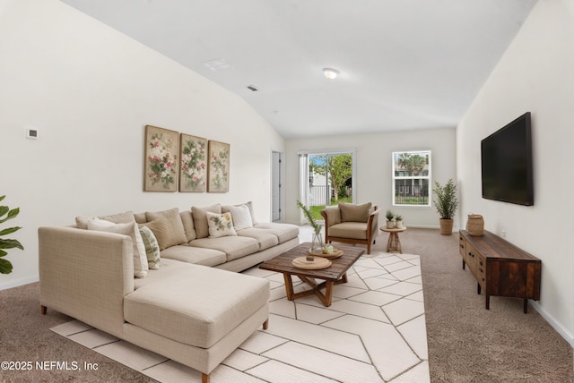 8244 Meadow Walk Ln, Jacksonville, FL 32256 - living room with light carpet, vaulted ceiling, and baseboards