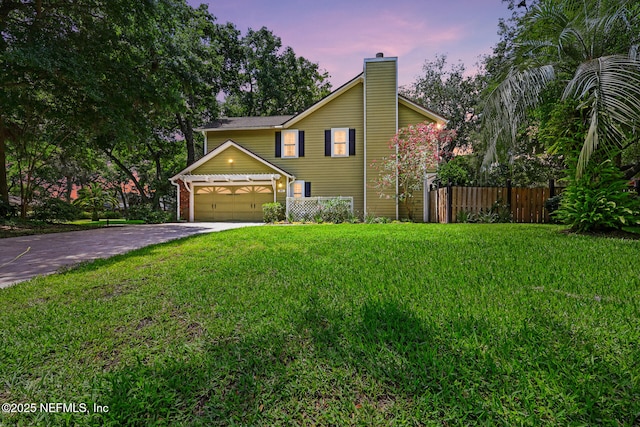 1917 Lakeside Dr S, Fernandina Beach, FL 32034 - view of front of property featuring a chimney, driveway, and an attached garage
