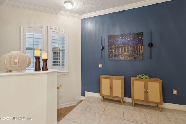 95050 Barclay Pl Unit 5B, Fernandina Beach, FL 32034 - foyer entrance with a textured ceiling, baseboards, tile patterned flooring, and ornamental molding