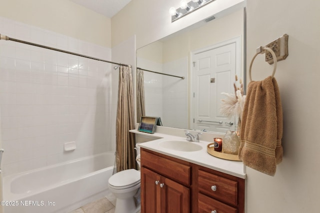95050 Barclay Pl Unit 5B, Fernandina Beach, FL 32034 - full bathroom featuring shower / tub combo, toilet, vanity, and tile patterned floors