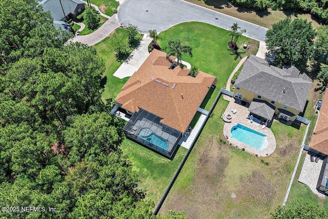 drone / aerial view of a pool area