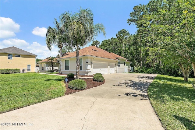 view of front of house featuring concrete driveway, a garage, a front yard, and stucco siding