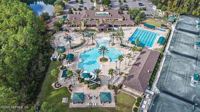 view of property location with a pool area