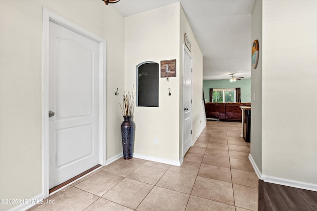1479 King Rail Ln, Middleburg, FL 32068 - hall with light tile patterned flooring and baseboards
