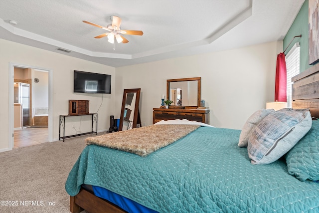 1479 King Rail Ln, Middleburg, FL 32068 - bedroom featuring a raised ceiling, multiple windows, carpet floors, and baseboards