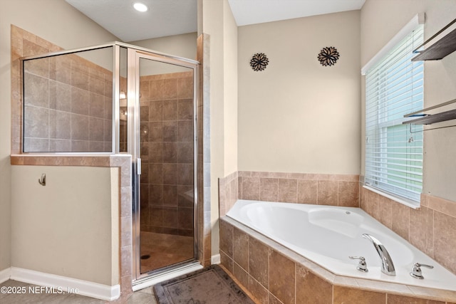 1479 King Rail Ln, Middleburg, FL 32068 - full bathroom with a shower stall, a garden tub, and plenty of natural light