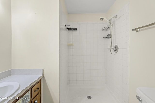 11437 Ricky Way, Jacksonville, FL 32223 - bathroom with toilet, vanity, and a tile shower