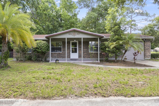 11437 Ricky Way, Jacksonville, FL 32223 - ranch-style house featuring brick siding, a front yard, a porch, and driveway