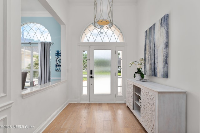 400 Big Tree Rd, Ponte Vedra Beach, FL 32082 - entryway with light wood-style floors, baseboards, and ornamental molding