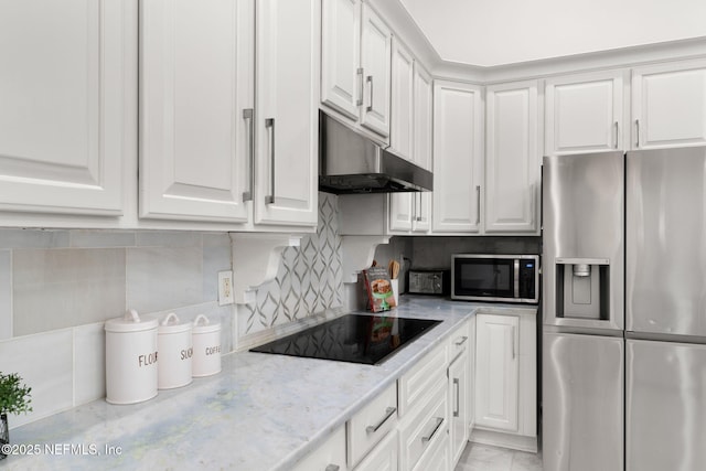 400 Big Tree Rd, Ponte Vedra Beach, FL 32082 - kitchen featuring appliances with stainless steel finishes, under cabinet range hood, white cabinets, and decorative backsplash