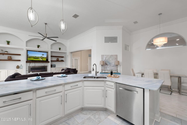 400 Big Tree Rd, Ponte Vedra Beach, FL 32082 - kitchen featuring stainless steel dishwasher, a sink, built in shelves, crown molding, and light stone countertops
