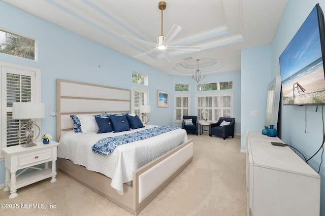 400 Big Tree Rd, Ponte Vedra Beach, FL 32082 - bedroom featuring light carpet, a chandelier, a tray ceiling, and a ceiling fan