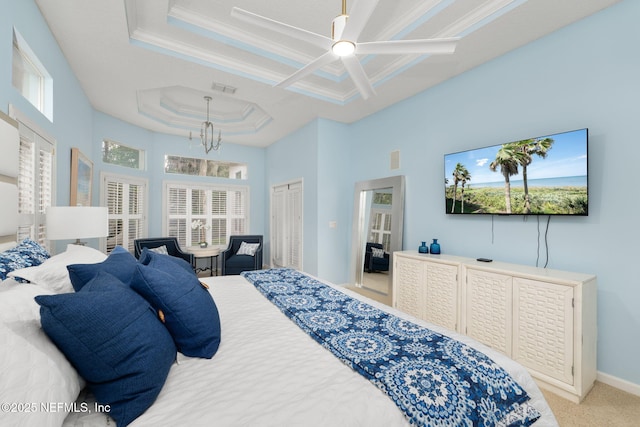 400 Big Tree Rd, Ponte Vedra Beach, FL 32082 - bedroom with a tray ceiling, light carpet, a towering ceiling, ornamental molding, and a ceiling fan